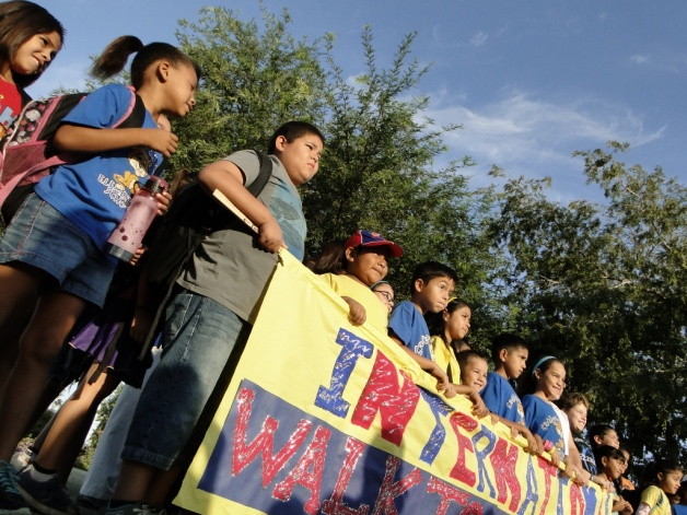 Children Marching with banner